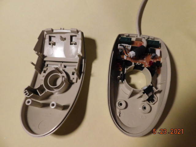 The mouse, after being taken apart for cleaning.