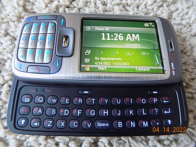The HTC phone, with the keyboard extended.