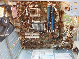 The badly weathered motherboard.