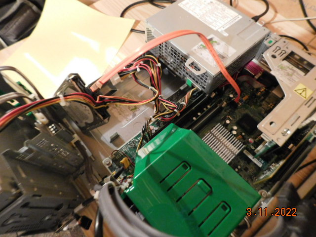 Another image of the internals of the Cisco, but this time with the drive bays folded out of the way.