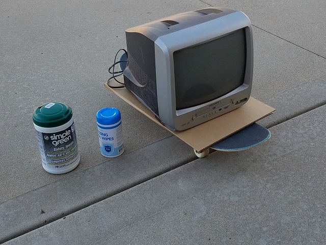 The Magnavox TV outside, in the process of being decontaminated.